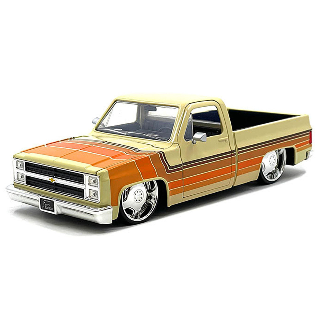 1985 Chevrolet C-10 Pickup Truck Beige with Stripes and Lowenhart Wheels "Just Trucks" Series 1/24 Diecast Model Car