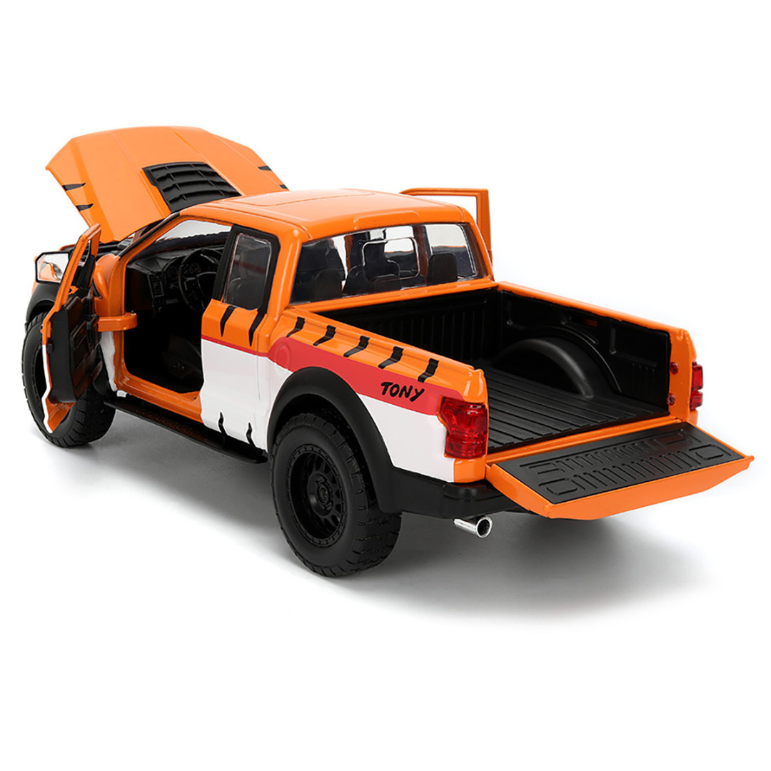 2017 Ford F-150 Raptor Pickup Truck "Frosted Flakes" Orange with Graphics and Tony the Tiger Diecast Figure "Hollywood Rides" Series 1/24 Diecast Model Car