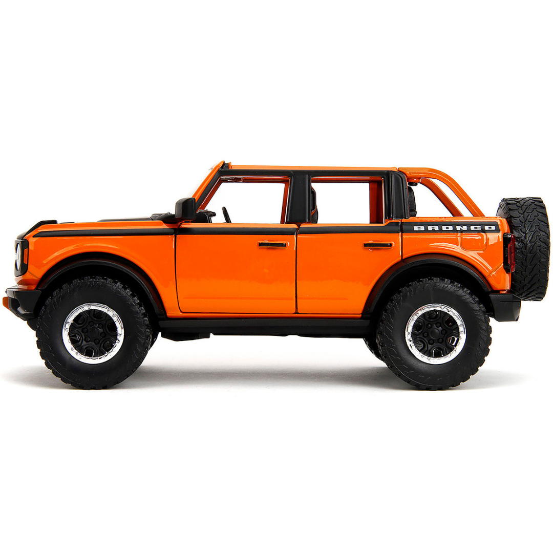 2021 Ford Bronco Open-Top Orange with Black Stripes and Hood with Extra Wheels "Just Trucks" Series 1/24 Diecast Model Car