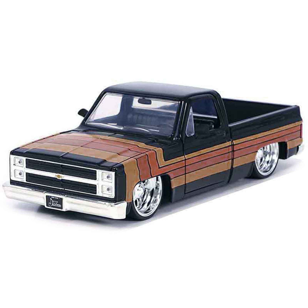 1985 Chevrolet C-10 Pickup Truck Black with Stripes and Paradox Wheels "Just Trucks" Series 1/24 Diecast Model Car