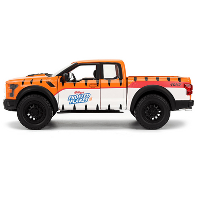 2017 Ford F-150 Raptor Pickup Truck "Frosted Flakes" Orange with Graphics and Tony the Tiger Diecast Figure "Hollywood Rides" Series 1/24 Diecast Model Car