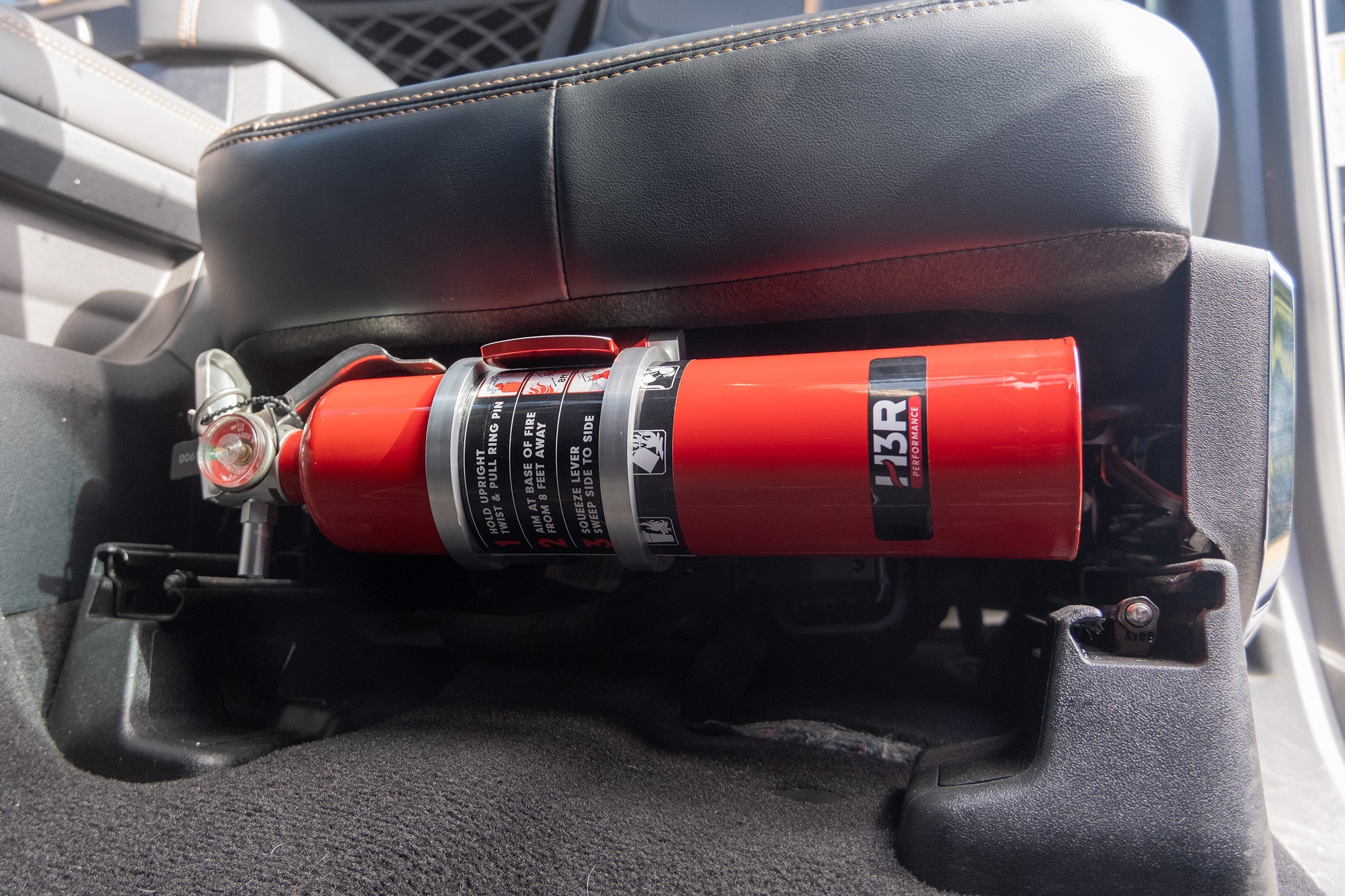 Direct Fit Fire Extinguisher Mount - Seat - Ford F-Series (including Super Duty & Expedition) (2018+), Escape, Mustang (2018-2022), Mustang Mach E (2020+)